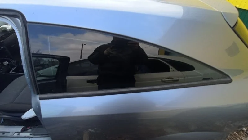 Стекло кузовное глухое левое Opel Astra H