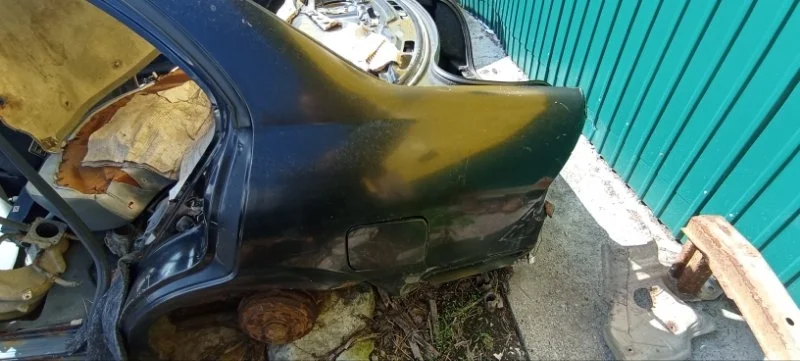 Крыло заднее левое Nissan Almera Classic B10