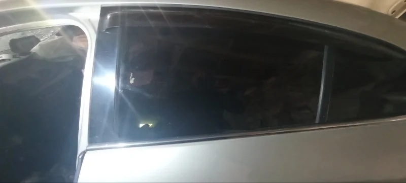 Стекло двери заднее левое Renault Fluence K4M