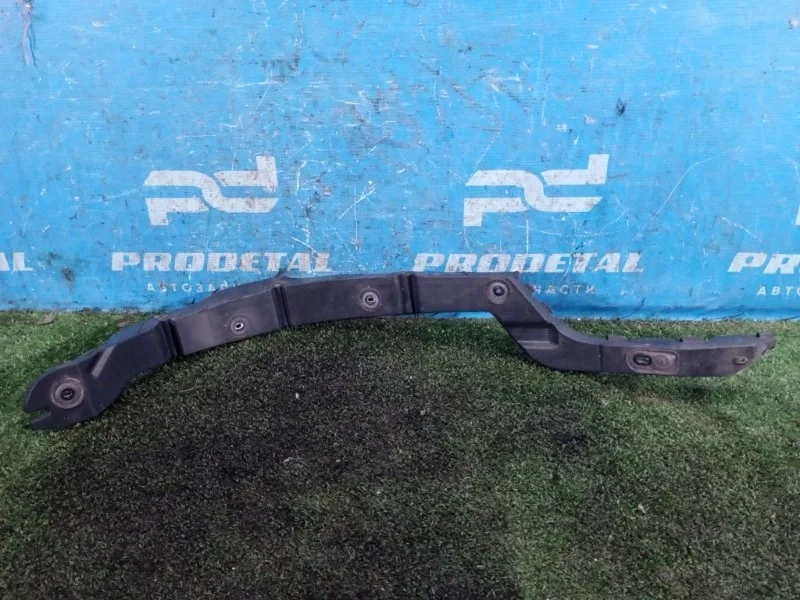 Кронштейн бампера задний левый Opel Astra H