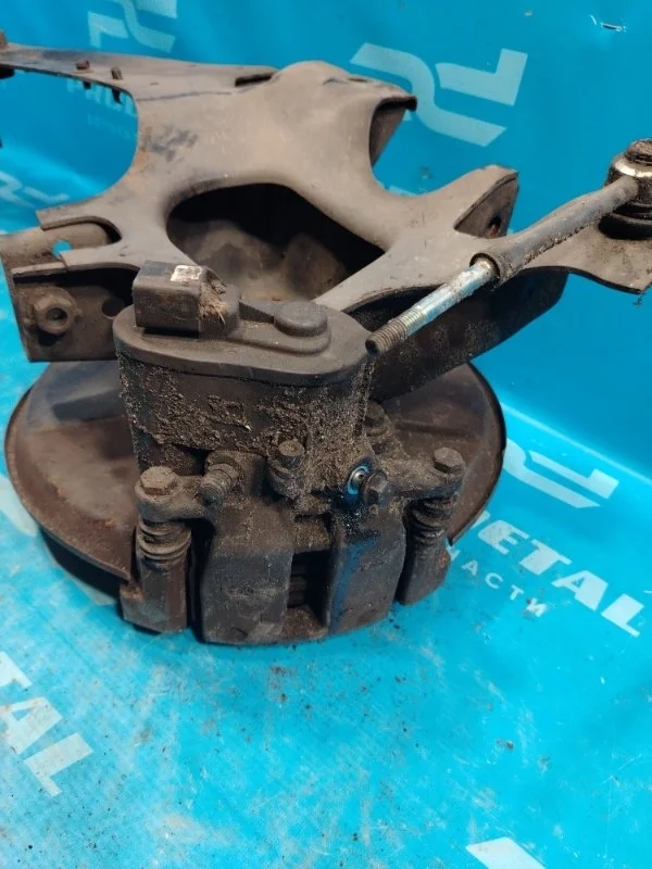 Суппорт тормозной задний левый Volvo XC70