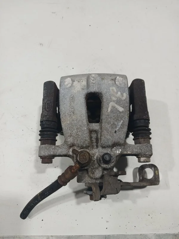 Суппорт тормозной задний левый KIA PRO CEED