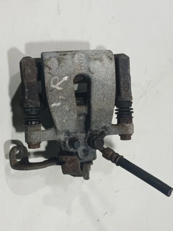 Суппорт тормозной задний правый KIA PRO CEED