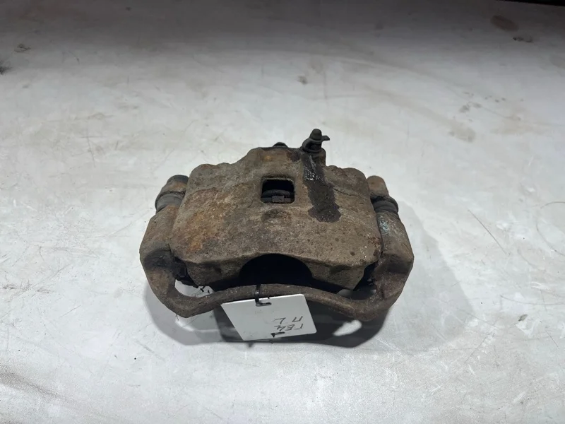 Суппорт тормозной передний левый Hyundai Getz