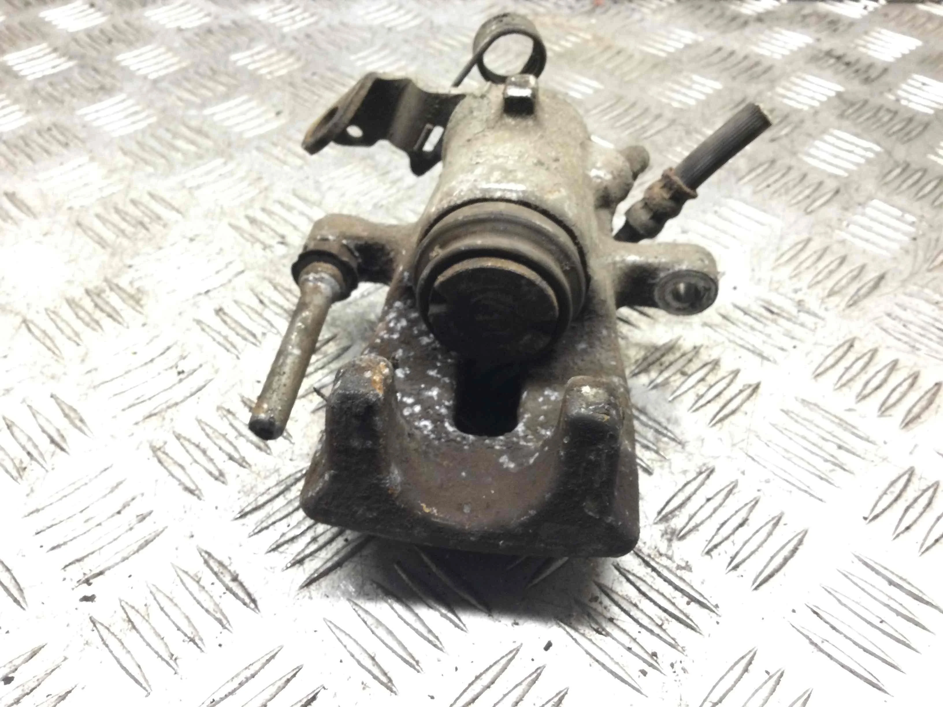 Суппорт задний левый Opel Astra H 2004-2007 дизель 1.9 DTH Механика Универсал