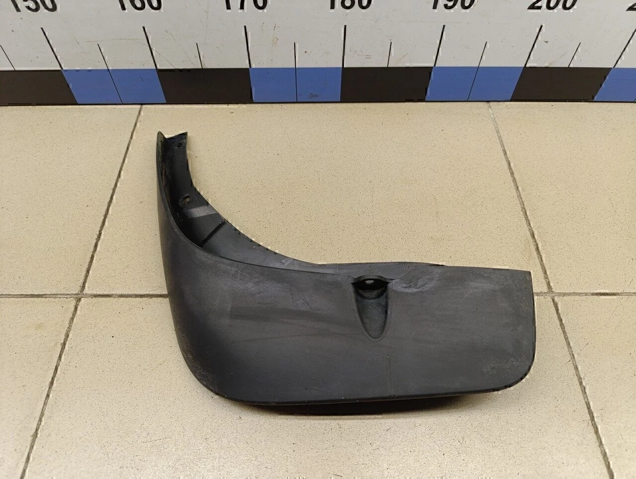 Брызговик задний левый Duster 2012>