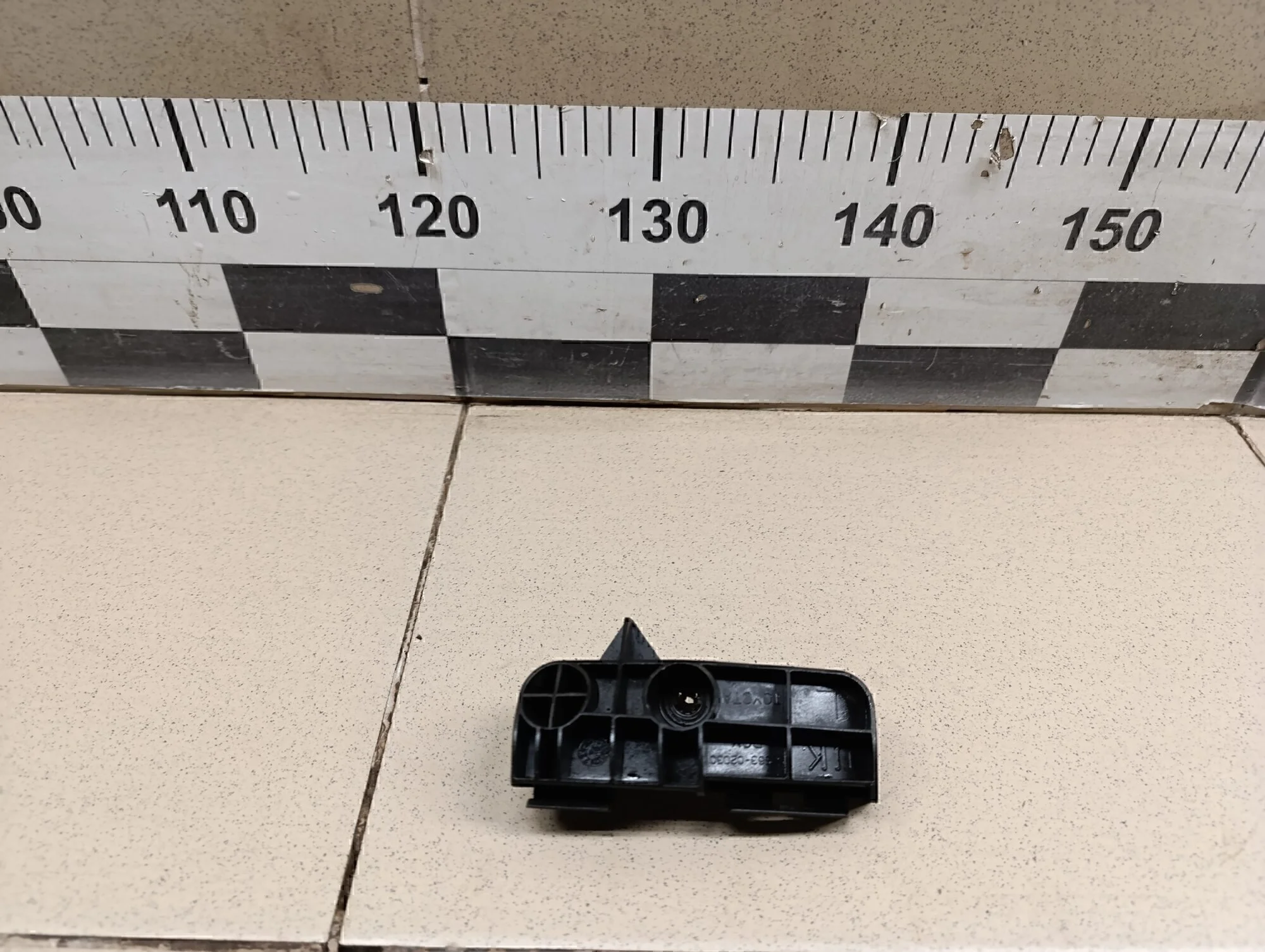 Кронштейн заднего бампера левый Corolla E12 2001-2006