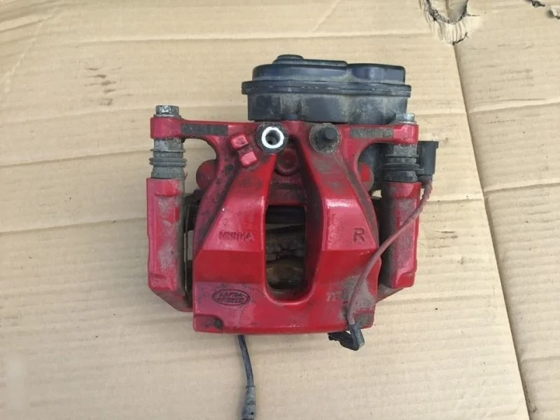 Суппорт задний правый Land Rover Range Rover Sport