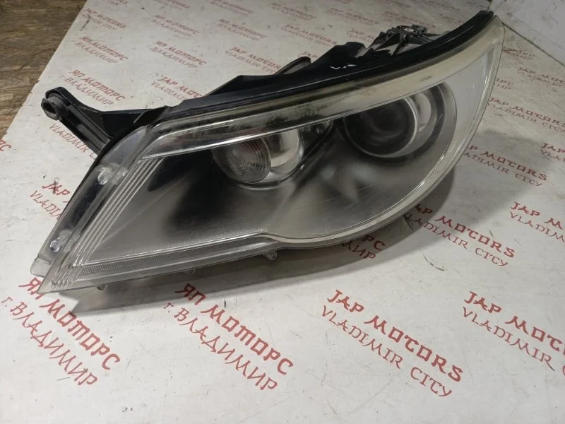Фара ксеноновая передняя левая Volkswagen Tiguan
