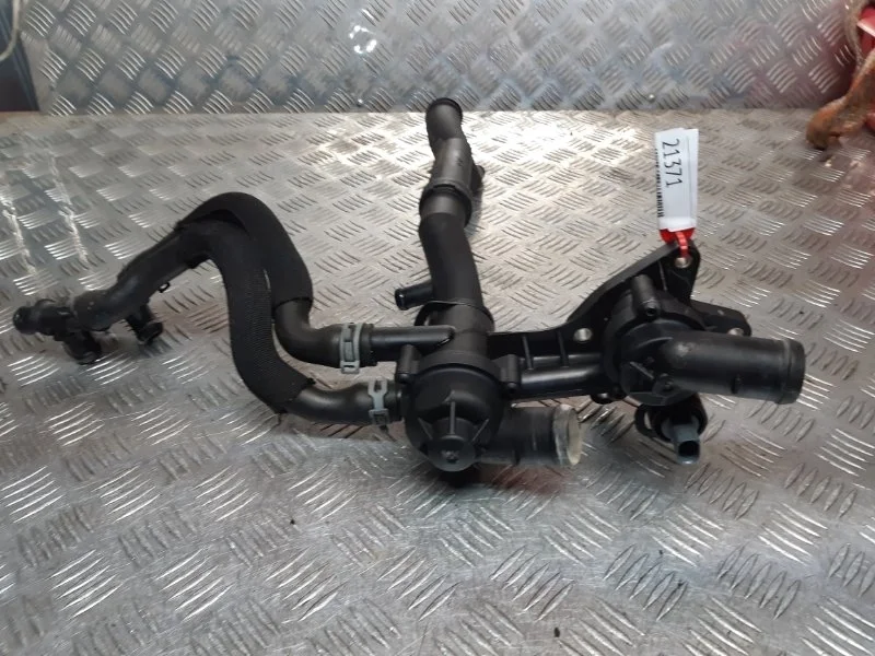 Термостат в сборе с корпусом Volkswagen Jetta