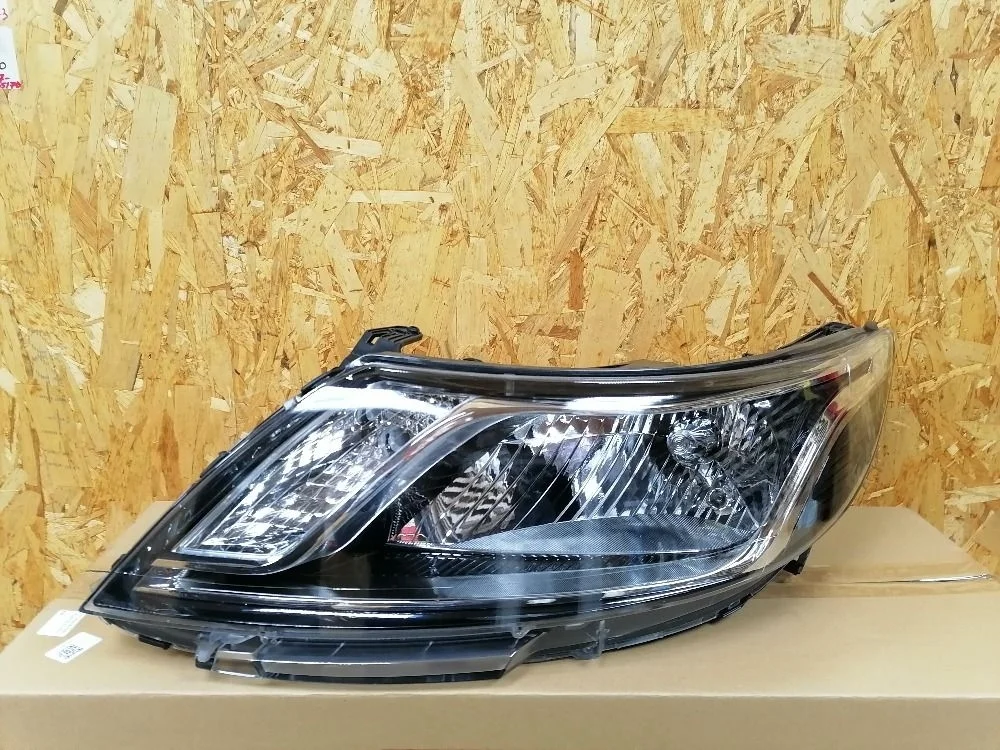 Фара левая Kia Rio III (2011—2015) 921014X000