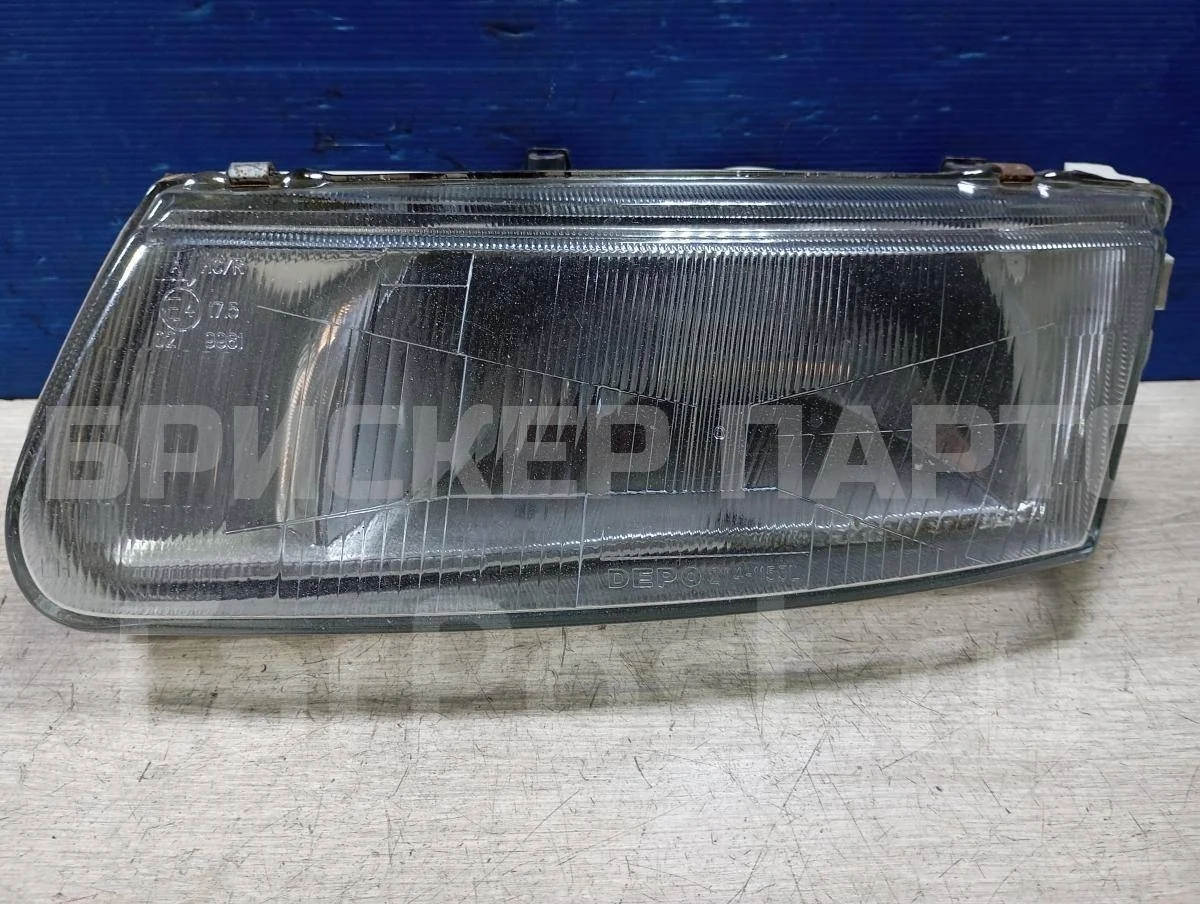 Фара левая Митсубиси Каризма 1
