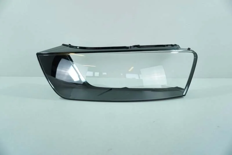 Стекло фары Audi Q3 2014-2018 8U0941773 8U, левое