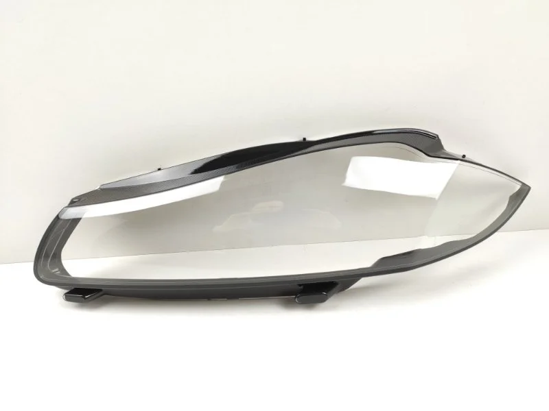 Стекло фары Jaguar XF 2011-2015 CX2313W030 X250, левое