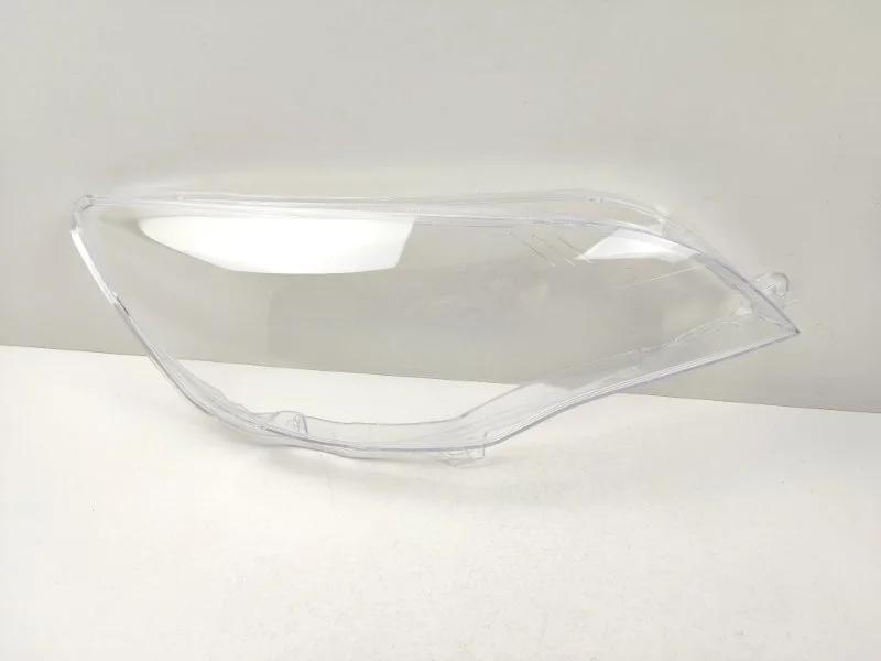 Стекло фары Opel Astra 2009-2017 13253657 J, правое