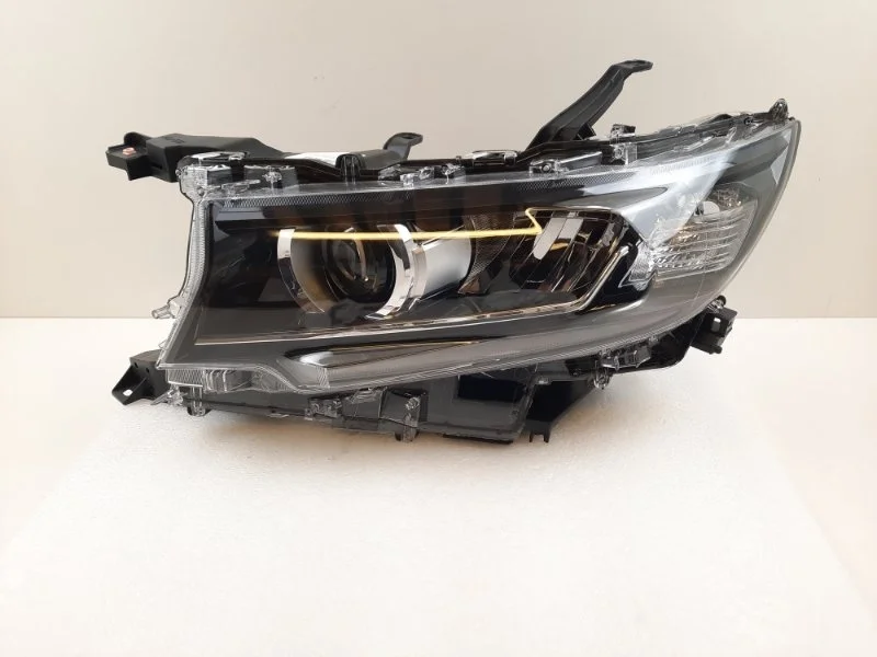 Фара Toyota Land Cruiser Prado 2018-2022 8118560N20 150, левая