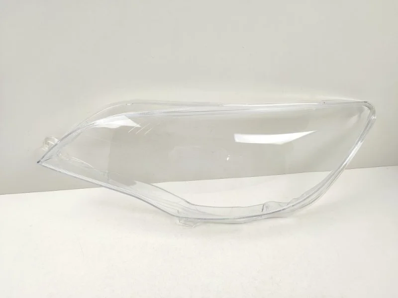 Стекло фары Opel Astra 2009-2017 13253656 J, левое