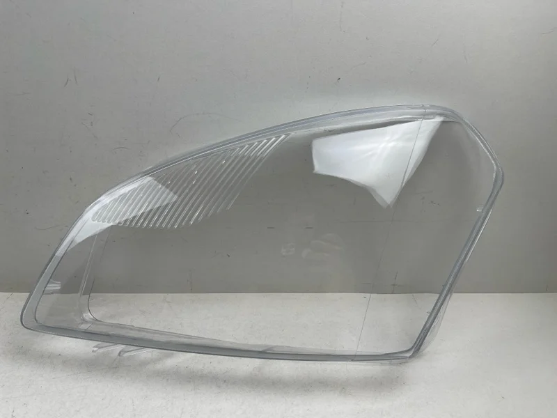 Стекло фары Nissan Qashqai 2006-2010 26010JD90A J10, левое