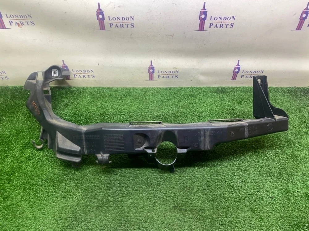 Кронштейн крепления фары BMW E90