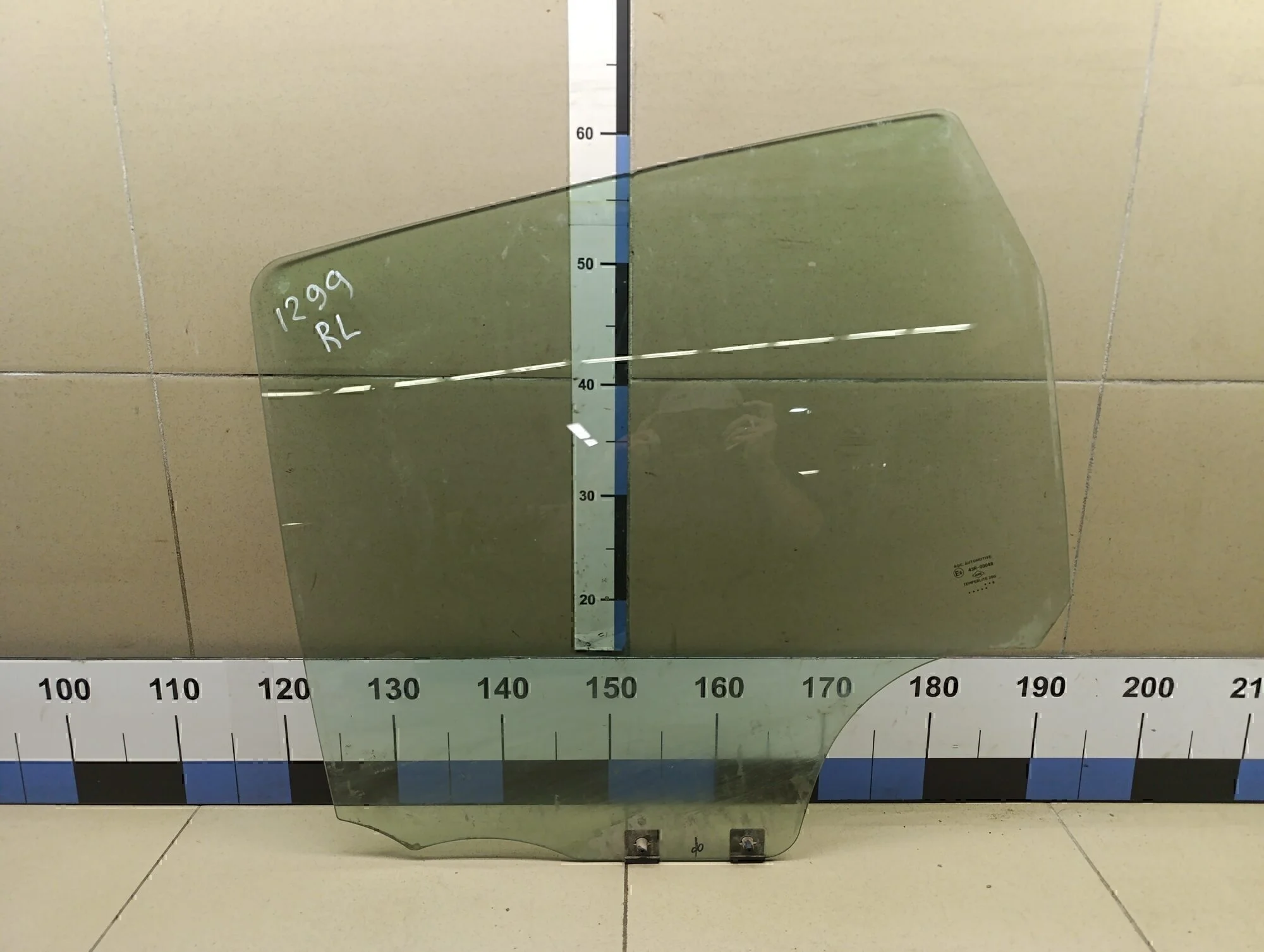 Стекло двери задней левой Duster 2012>