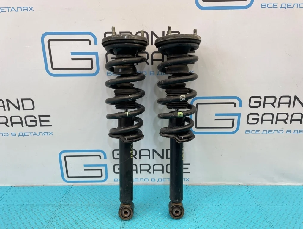 Стойки подвески Mitsubishi Pajero 2010 4062A024 V93W 6G72 3.0, передние