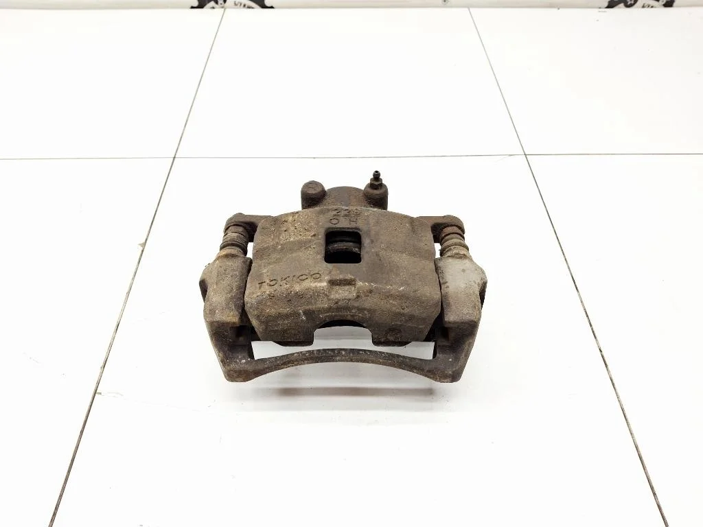 Суппорт передний правый Mitsubishi L200 2012 KA, KB