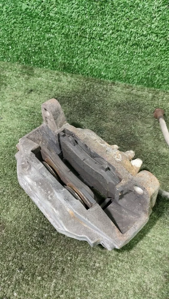 Суппорт Nissan Patrol 2011 410111LB0A Y62 VK56VD, передний левый