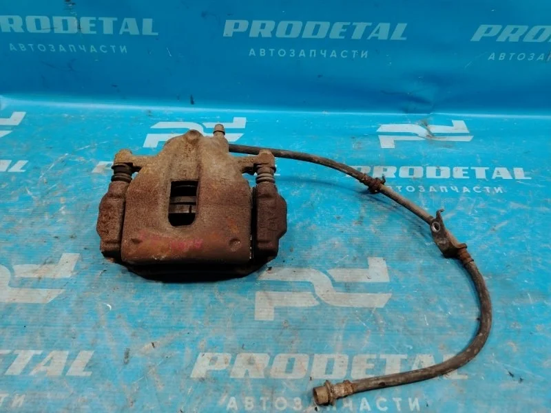 Суппорт тормозной передний правый Toyota Auris E15