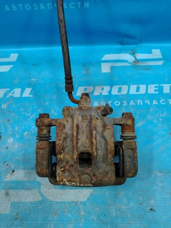 Суппорт тормозной задний правый Ssang Yong Actyon