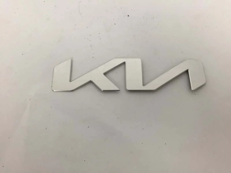 Эмблема капота Kia K5 2020-2023 66400L2000 3, передняя