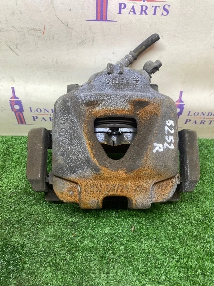 Суппорт тормозной BMW X1 18i E84