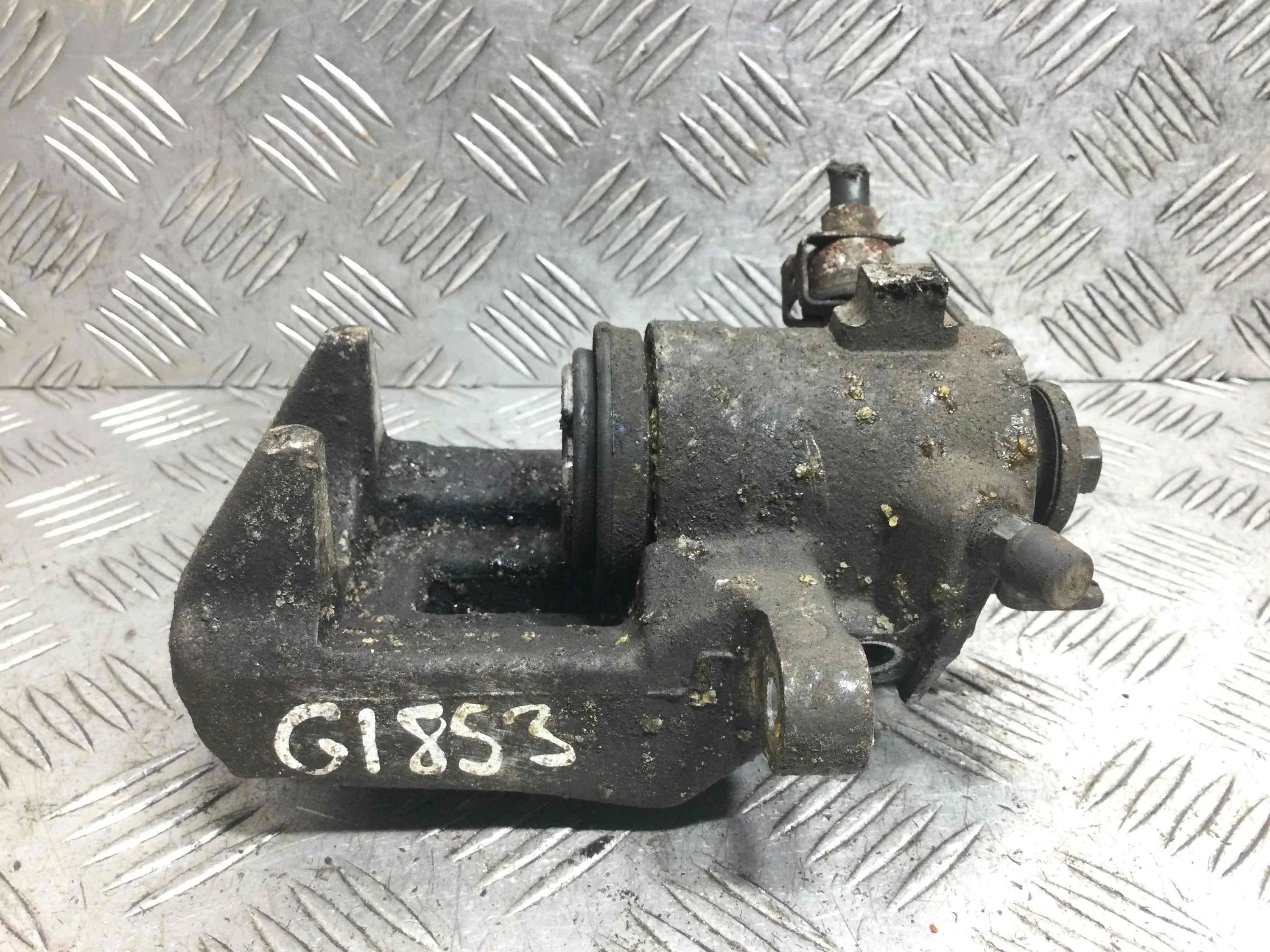 Суппорт задний левый Volkswagen Golf 4 поколение (1997-2004) бензин 1.4 i Механика Х/б