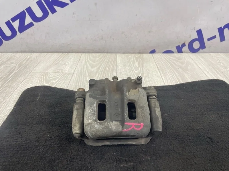 Суппорт тормозной Mitsubishi Pajero 2009 V93W