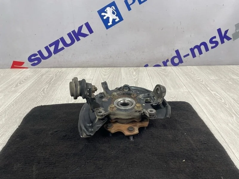 Кулак поворотный Mitsubishi Pajero 2009 V93W