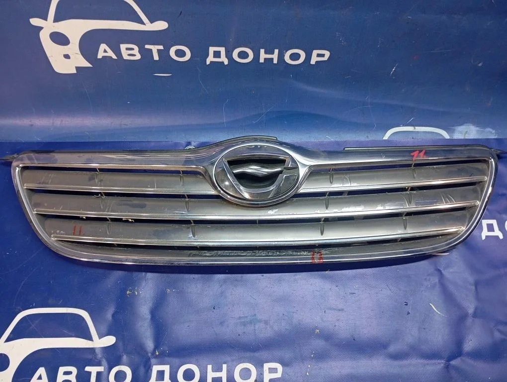 решетка радиатора TOYOTA COROLLA NZE124 1NZFE