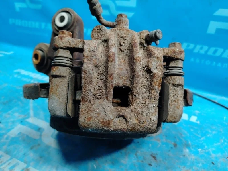 Суппорт тормозной задний правый Ssang Yong Actyon