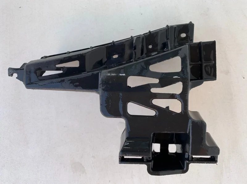 Кронштейн бампера Mazda 3 2003-2009 BR5V502B1 BK, передний левый