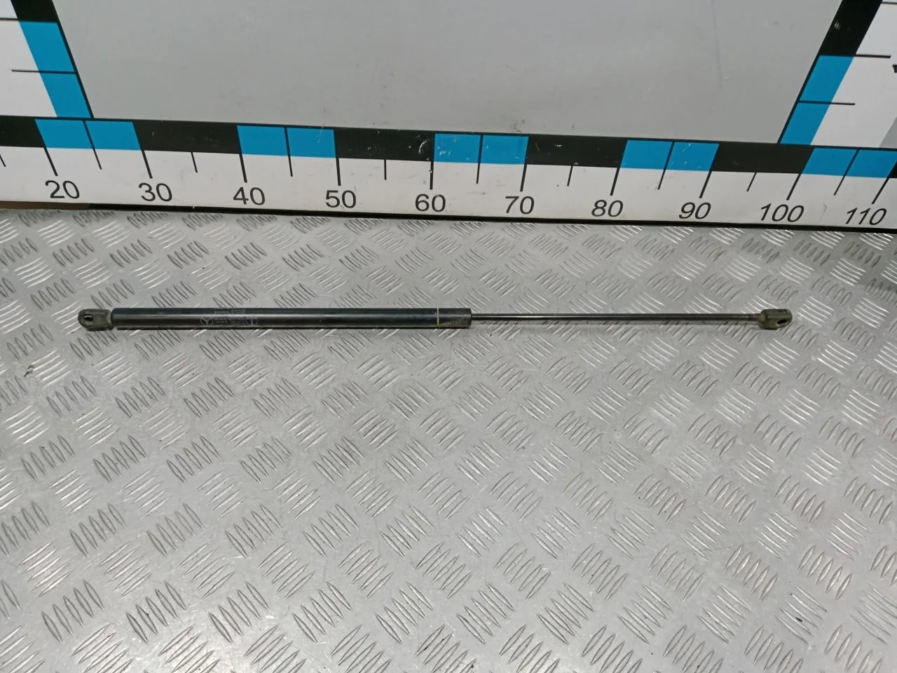 [Б/У] Амортизатор капота Mercedes Benz [Код: 00661341 ]