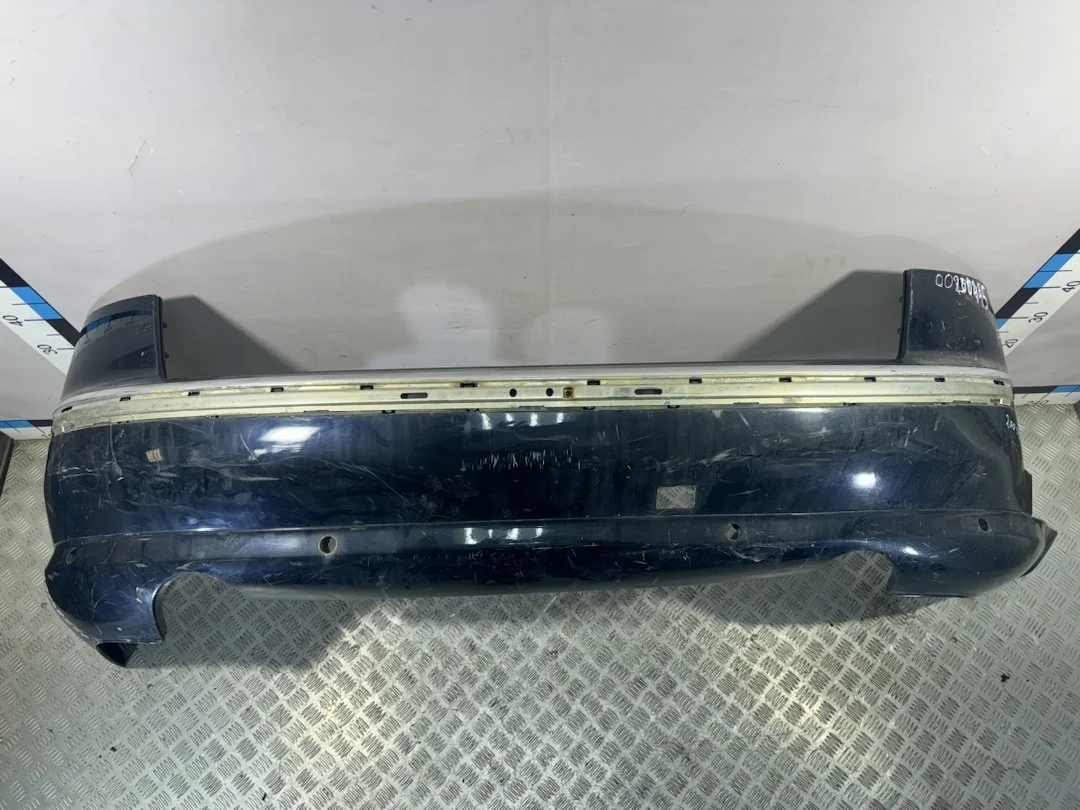 [Б/У] Бампер задний (под парктрон) Audi A8 4E - надрыв справа сбоку [Незначительные дефекты] [Код: 00290105 ]