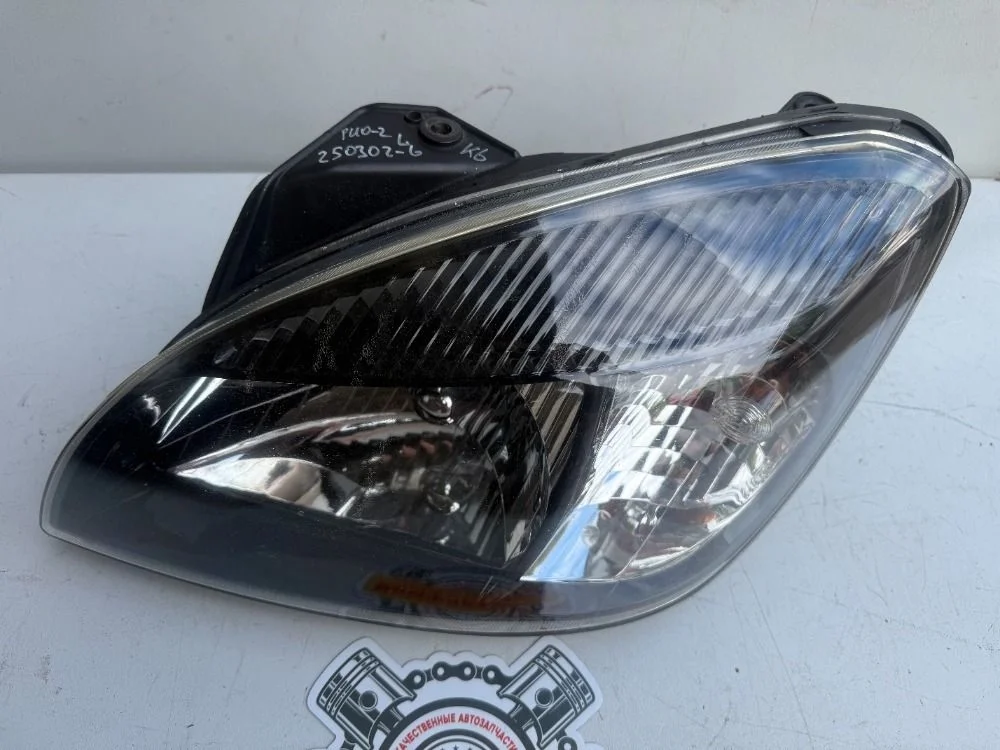 Фара левая Kia Rio II рестайлинг (2009—2011)