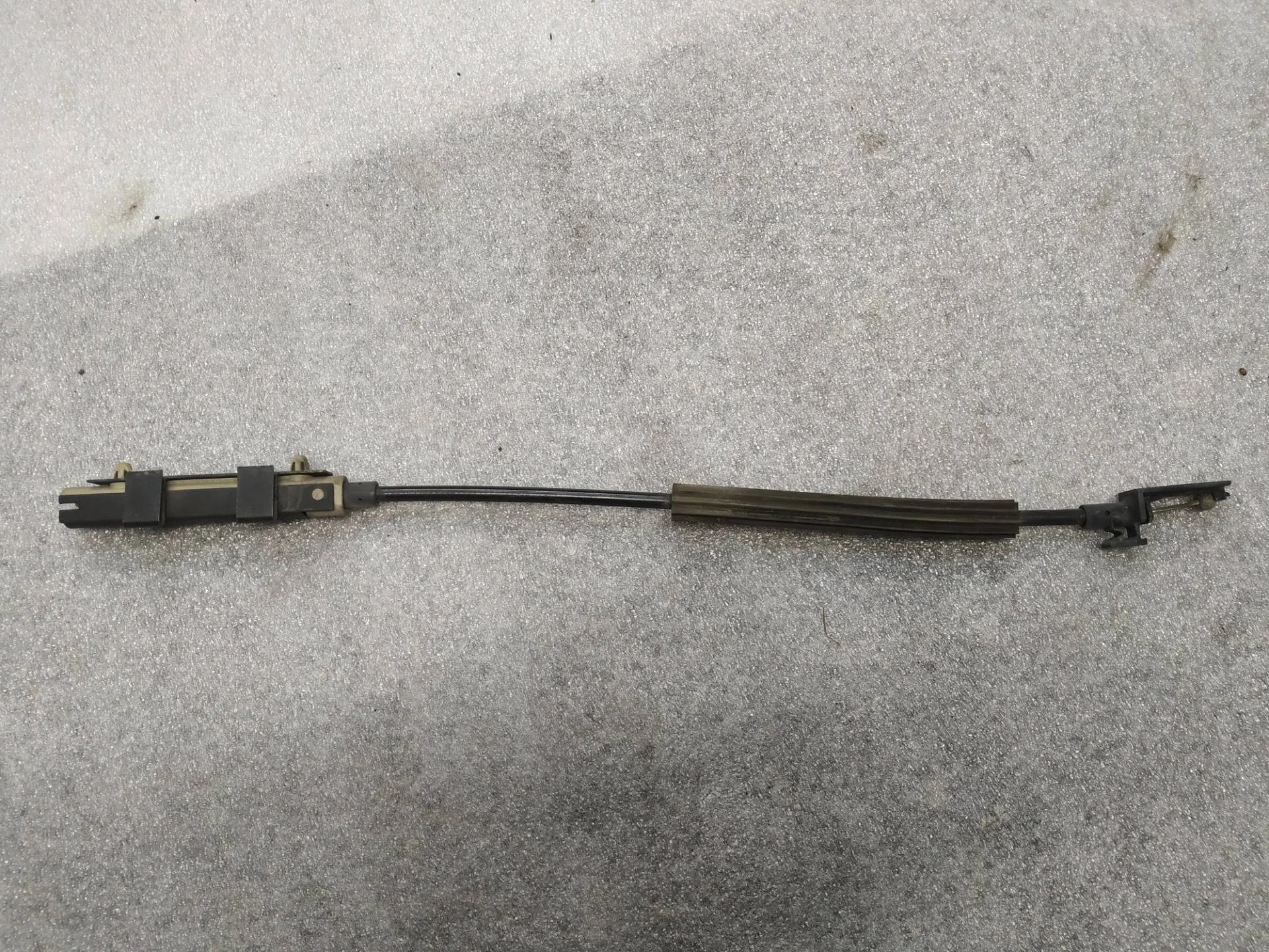 трос капота Volkswagen Touareg 2 7P6 2012