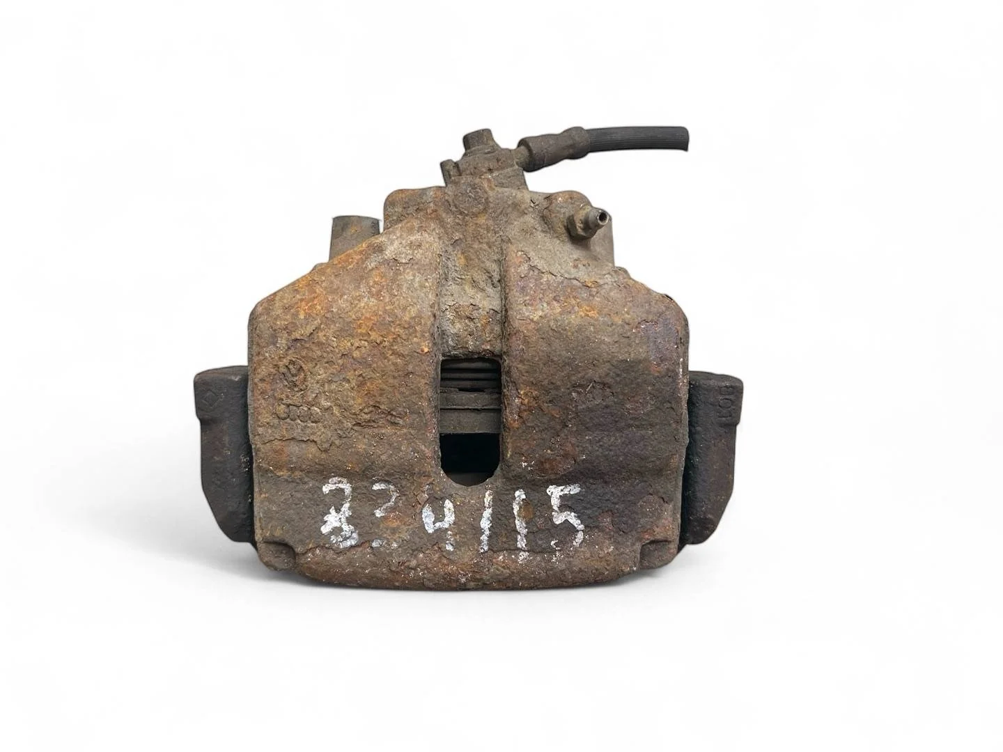 суппорт тормозной передний левый Volkswagen Caddy 3