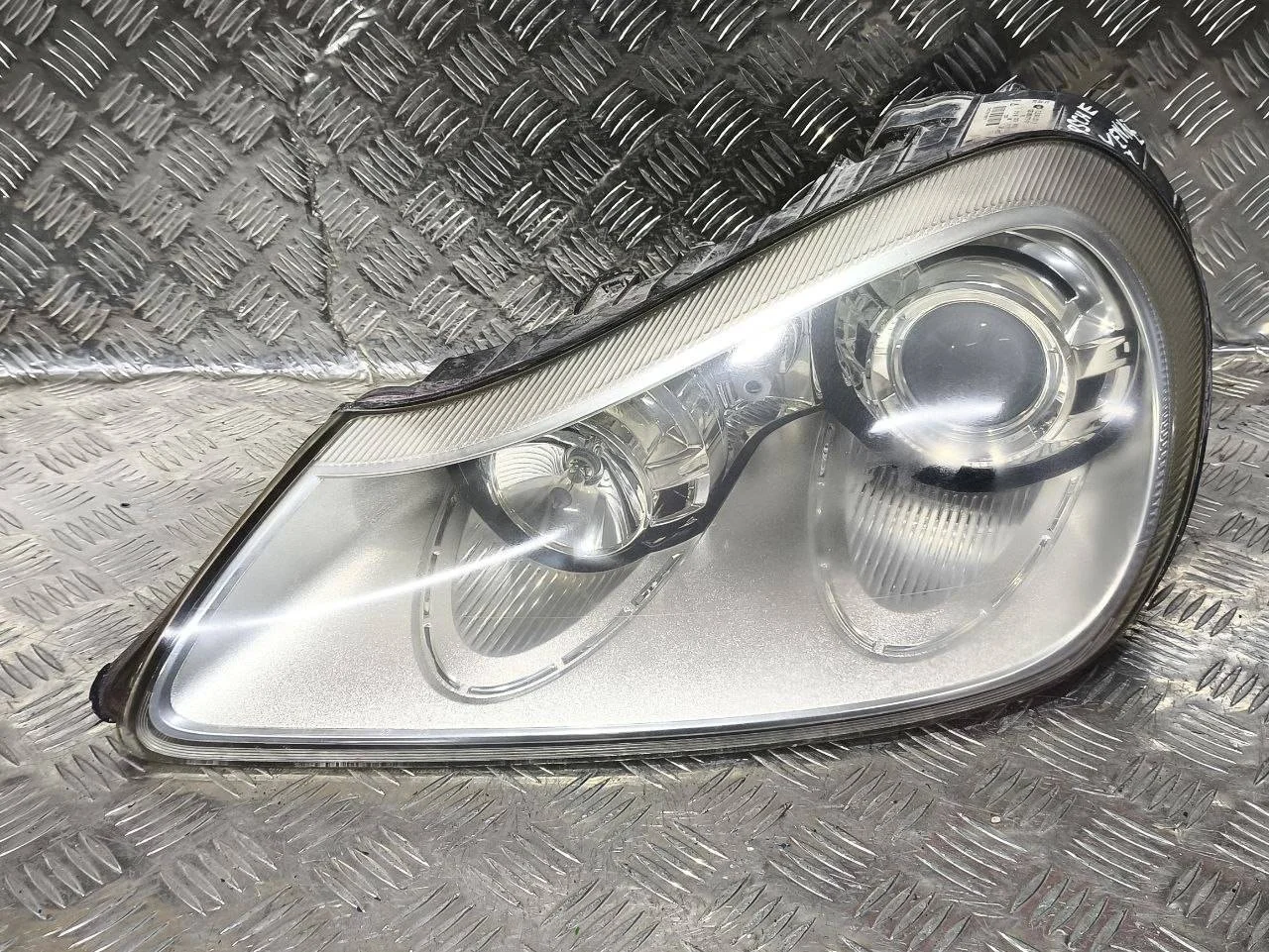 фара левая Porsche Cayenne 957