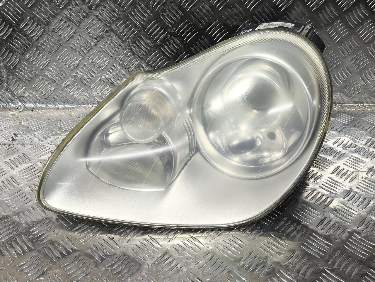 фара левая Porsche Cayenne 955