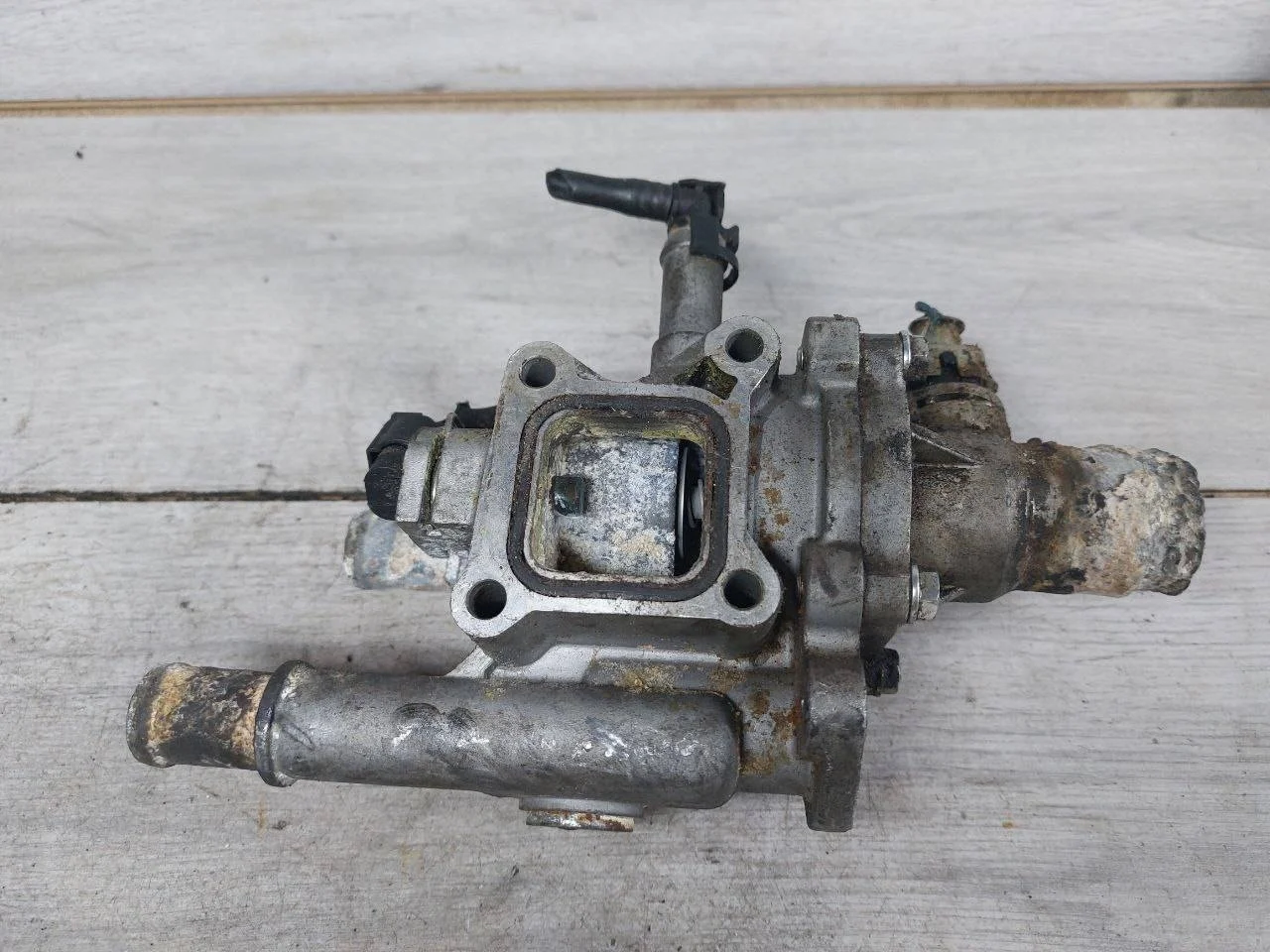 корпус термостата Opel Astra H рест.