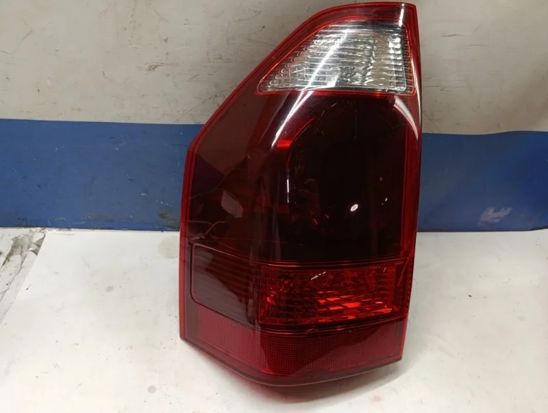 Фонарь Mitsubishi Pajero 2005 MN133765 V78W 4M41, задний левый