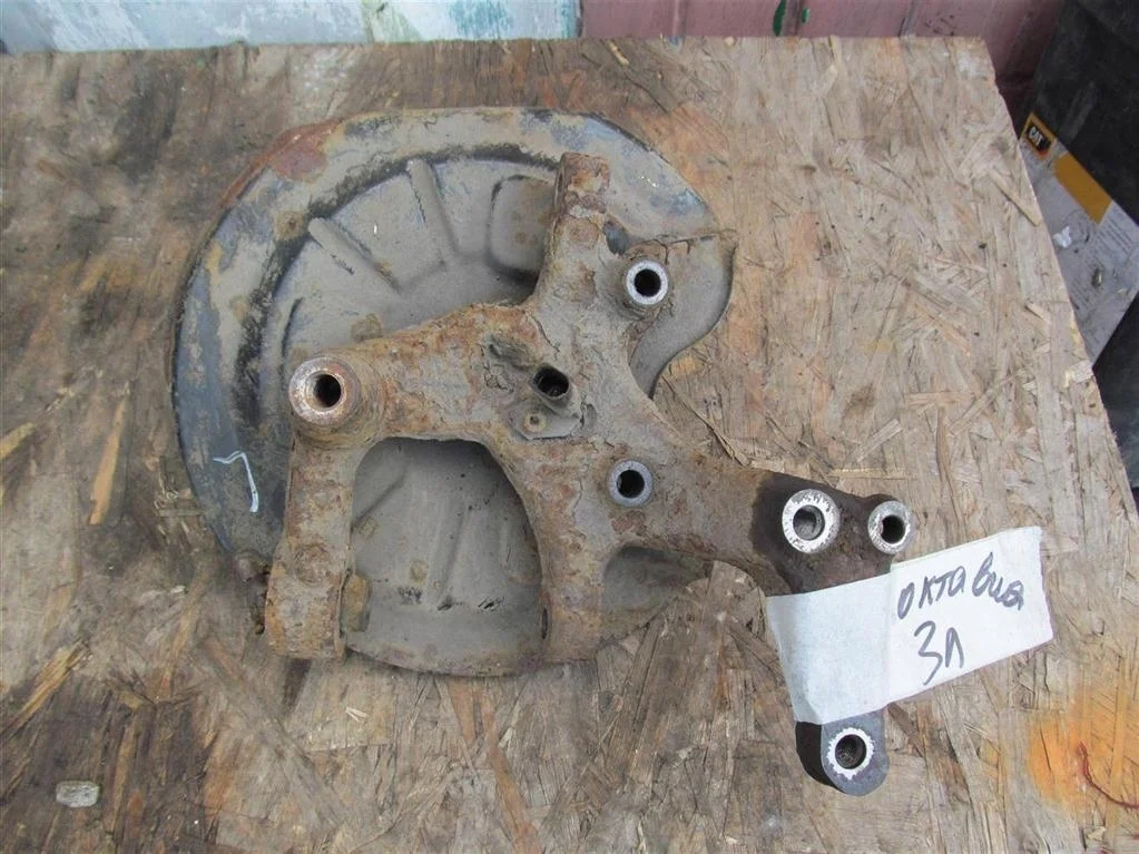 кулак поворотный Skoda Octavia II рестайлинг (2008—2013) Skoda Octavia