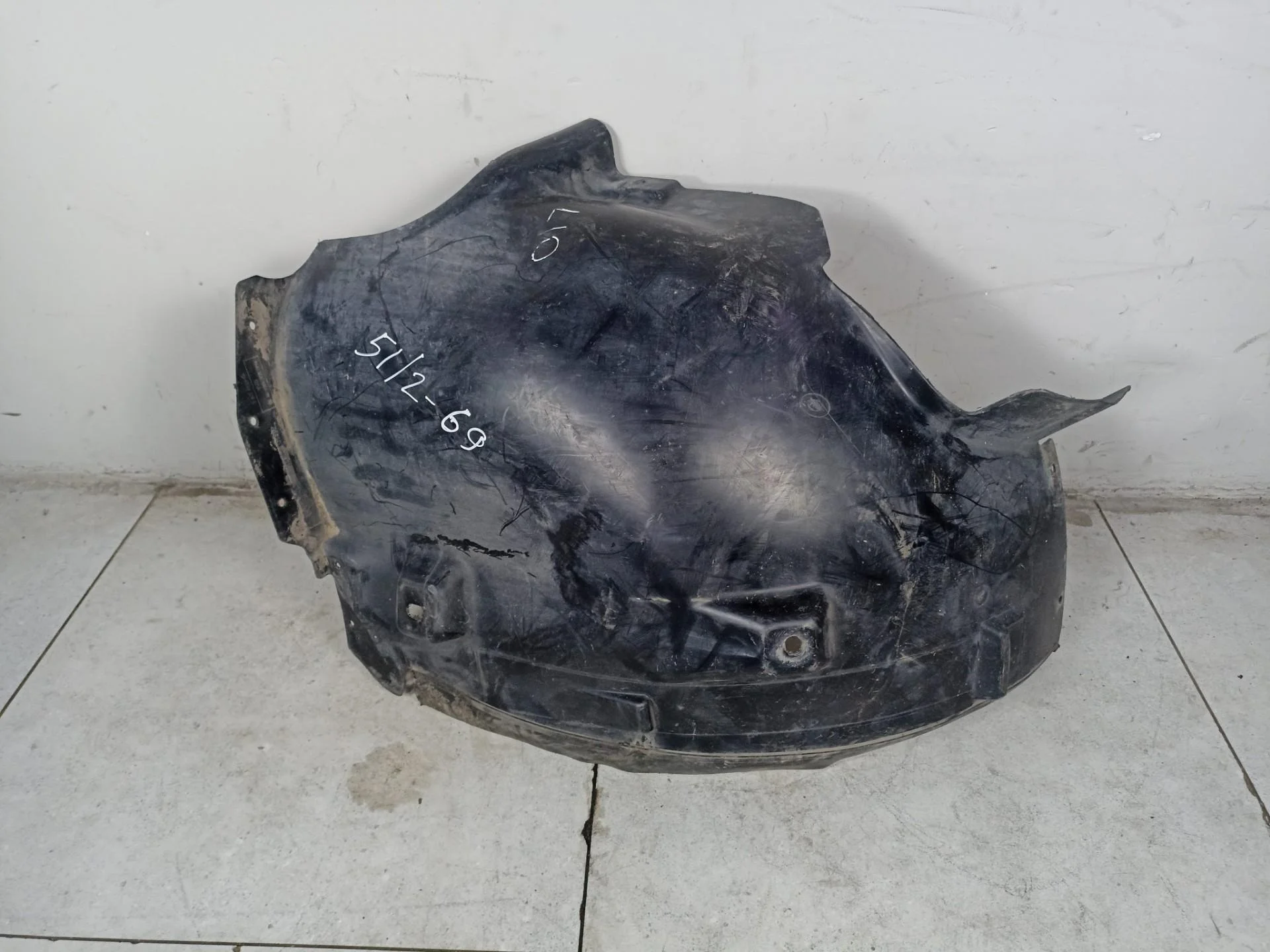 Задняя часть подкрылка переднего правого