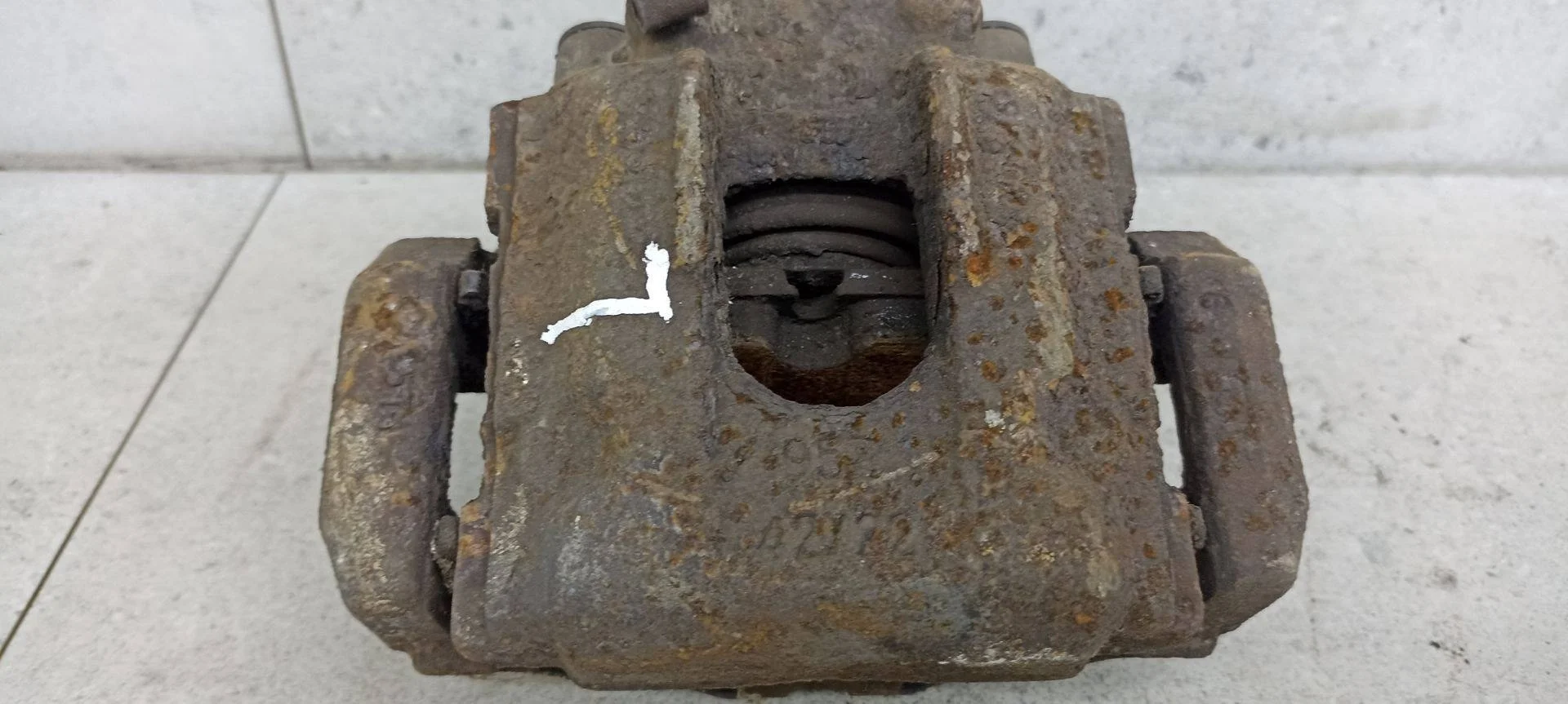 Суппорт тормозной задний левый BMW X3 E83 рест.