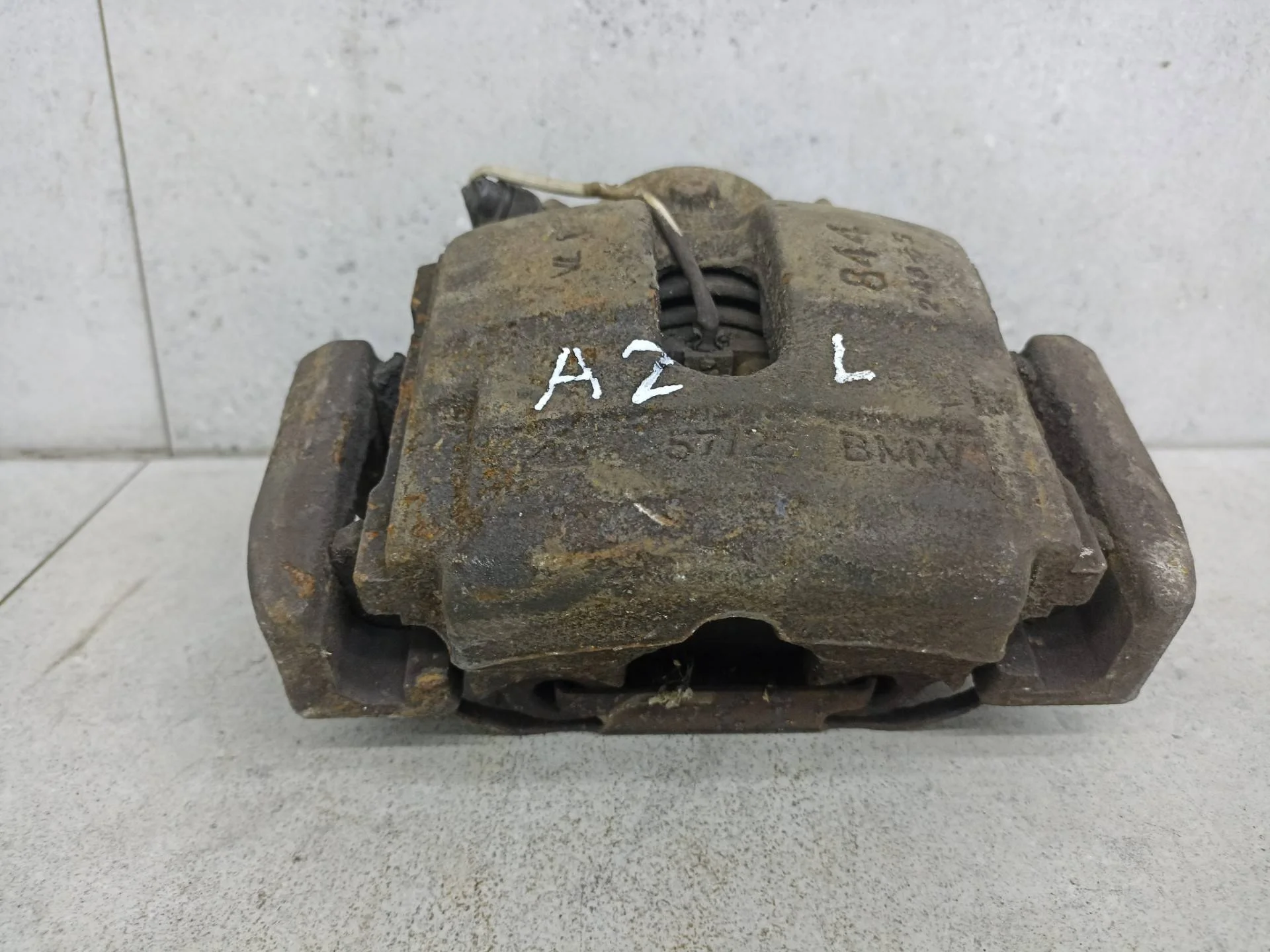 Суппорт тормозной передний левый BMW X3 E83 рест.